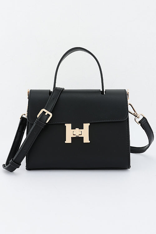 Black Clara top-handle bag, front view with detachable crossbody strap