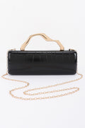 Celeste black clutch opened to show interior