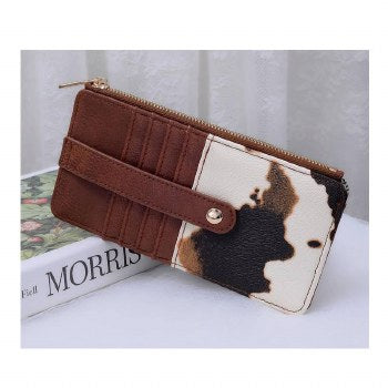 Miranda Cow Print zip wallet with brown card slots and snap strap